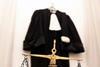 Court robes and justice scales