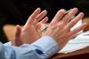 Gesticulating hands in meeting
