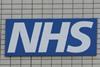 NHS sign on wall