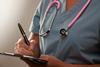 Doctor with notepad