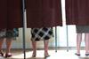 People in polling booths