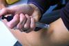 Diabetic insulin injection into arm