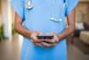 Doctor with mobile phone