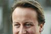 A smiling prime minister David Cameron