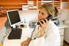 Doctor on the phone to commission support