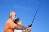Older man and woman fishing