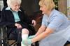 Older woman with nurse