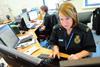 Ambulance triage: woman at desk with computer