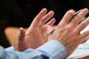 Gesticulating hands in meeting