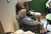 An older lady in wheelchair in nursing home