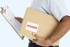 Man holding box and clipboard. The box says power on the label