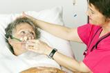 Woman patient with oxygen mask