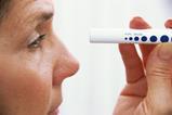 Woman having eye test