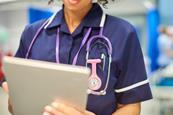 nurse close-up with tablet-926447760