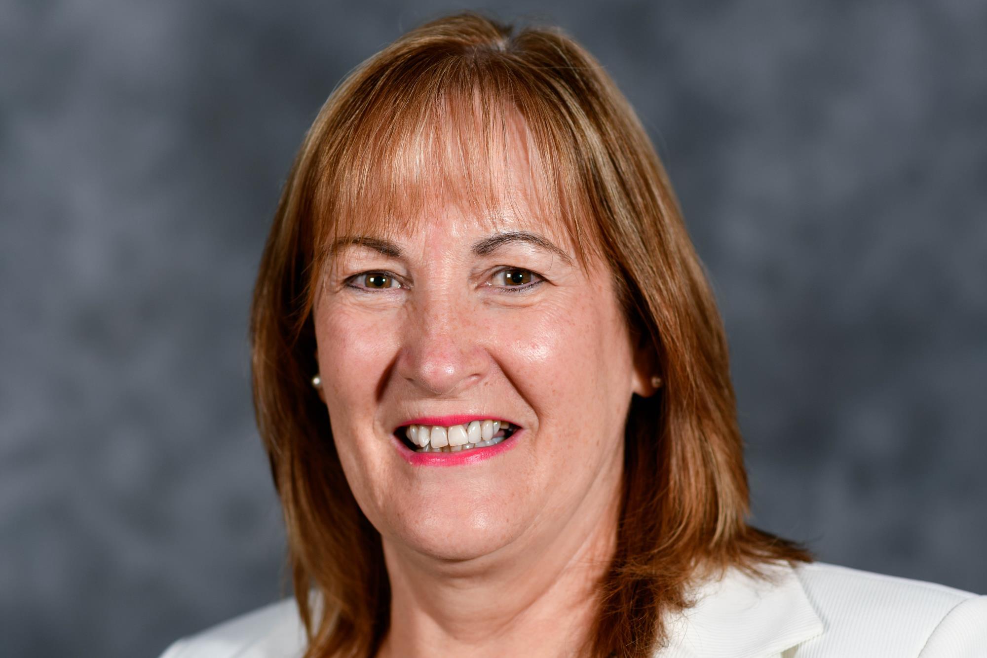 A knowing smile from someone perhaps part of her intimate circle