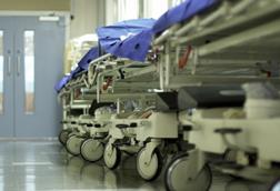 Hospital corridor with gurneys-157533457