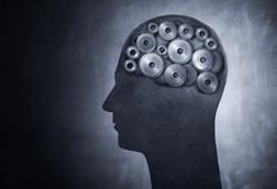 Conceptual image of head filled with cog gears
