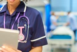 nurse close-up with tablet-926447760