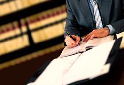 Lawyer signing contracts legal