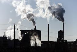 Industrial chimneys smoking with pollution