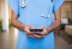 Doctor with mobile phone