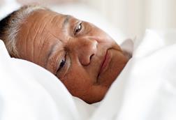 Elderly woman in bed