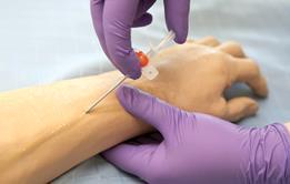 Injecting a rubber hand for doctors' training