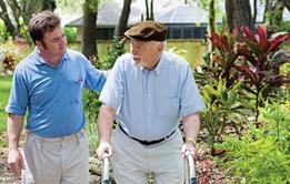 Carer with elderly man