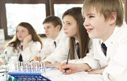 community services young students in class boys girls science school