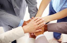 A group of people making a pact