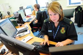 Ambulance triage: woman at desk with computer