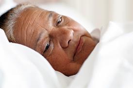 Elderly woman in bed