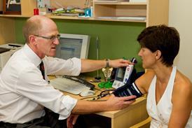 Doctor at GP surgery