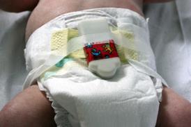 Baby measurement device, attached to a nappy