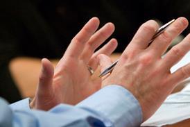 Gesticulating hands in meeting