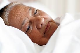 Elderly woman in bed