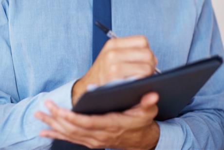 clipboard_meeting_notes_writing