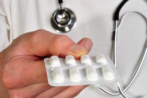 Doctor prescribing pills