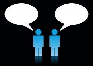 Graphic of two people with speech bubbles