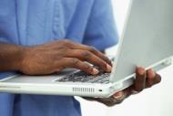 Doctor using laptop