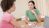 Woman_GP_with_young_woman_patient