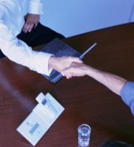 Job offer, shaking hands