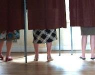 People in polling booths