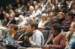 Man talking in crowd