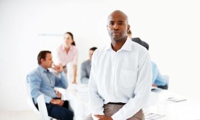 Black man in office setting