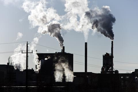 Industrial chimneys smoking with pollution