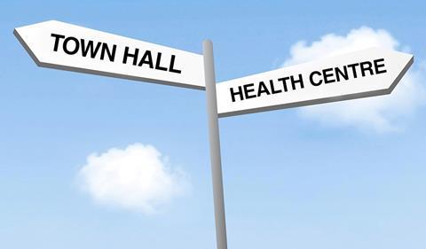 Sign post for town hall and health centre