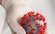 Coronavirus in gloved hand